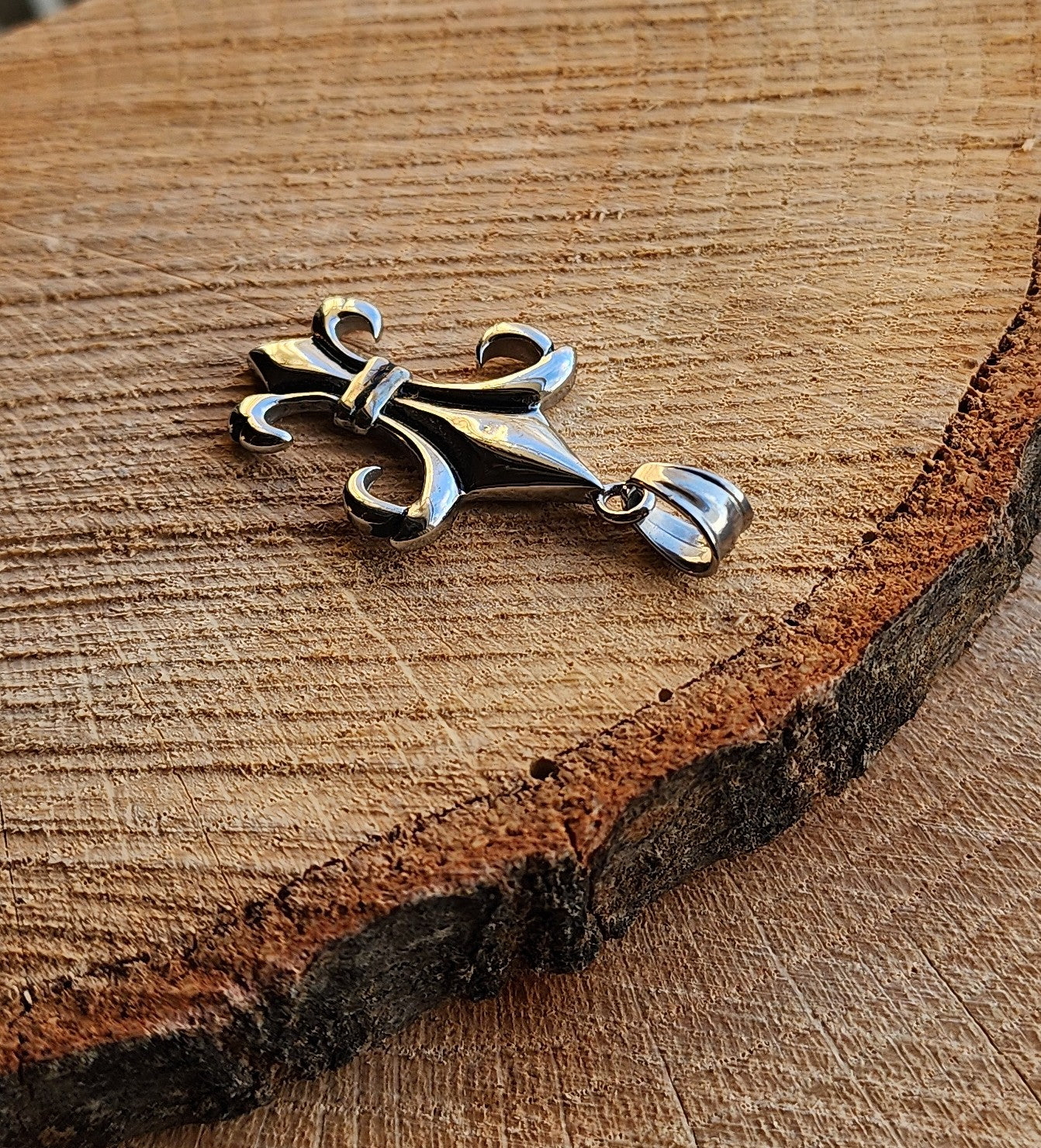 Elongated Fleur De Lis Stainless Steel Pendant