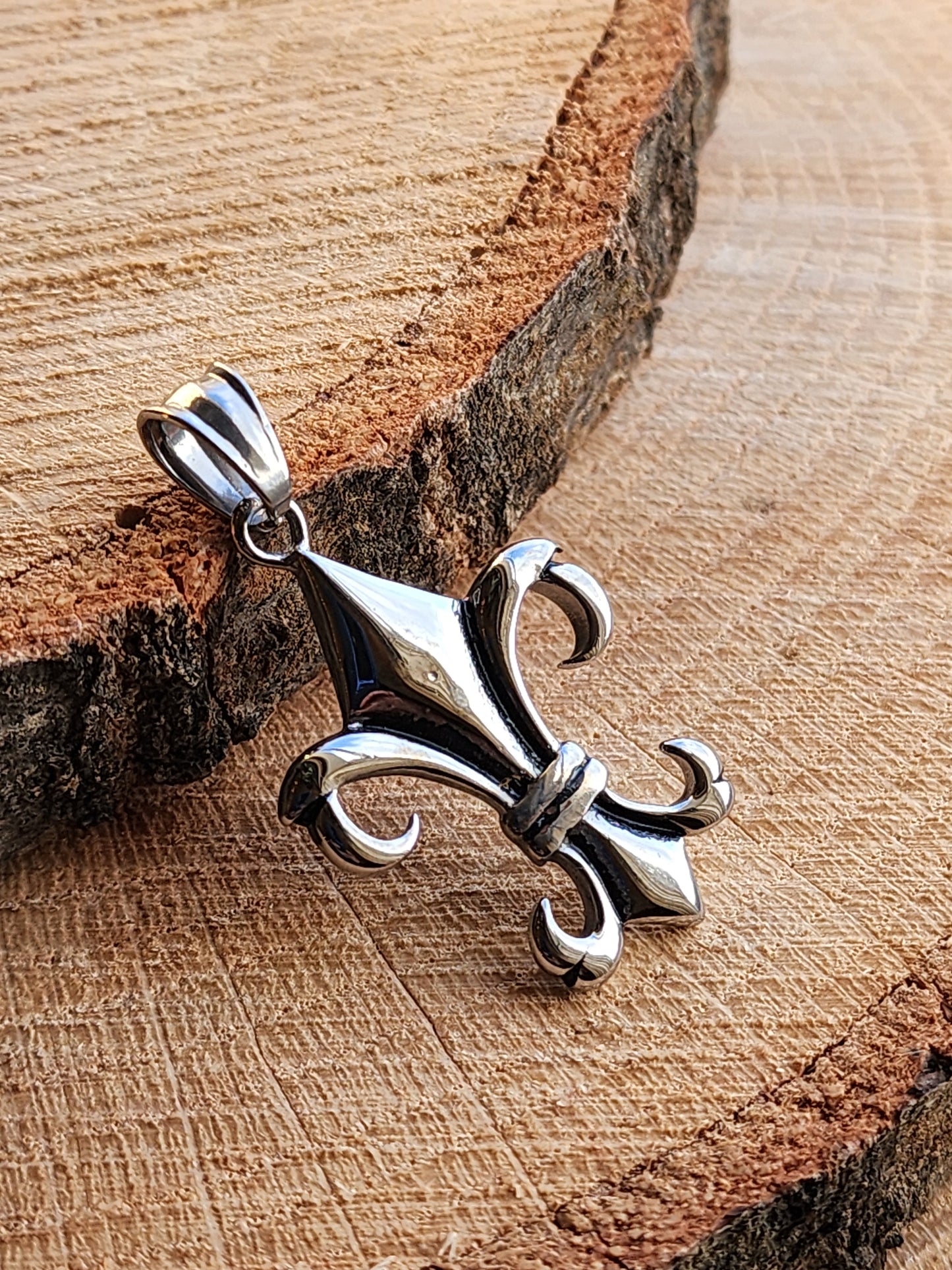 Elongated Fleur De Lis Stainless Steel Pendant