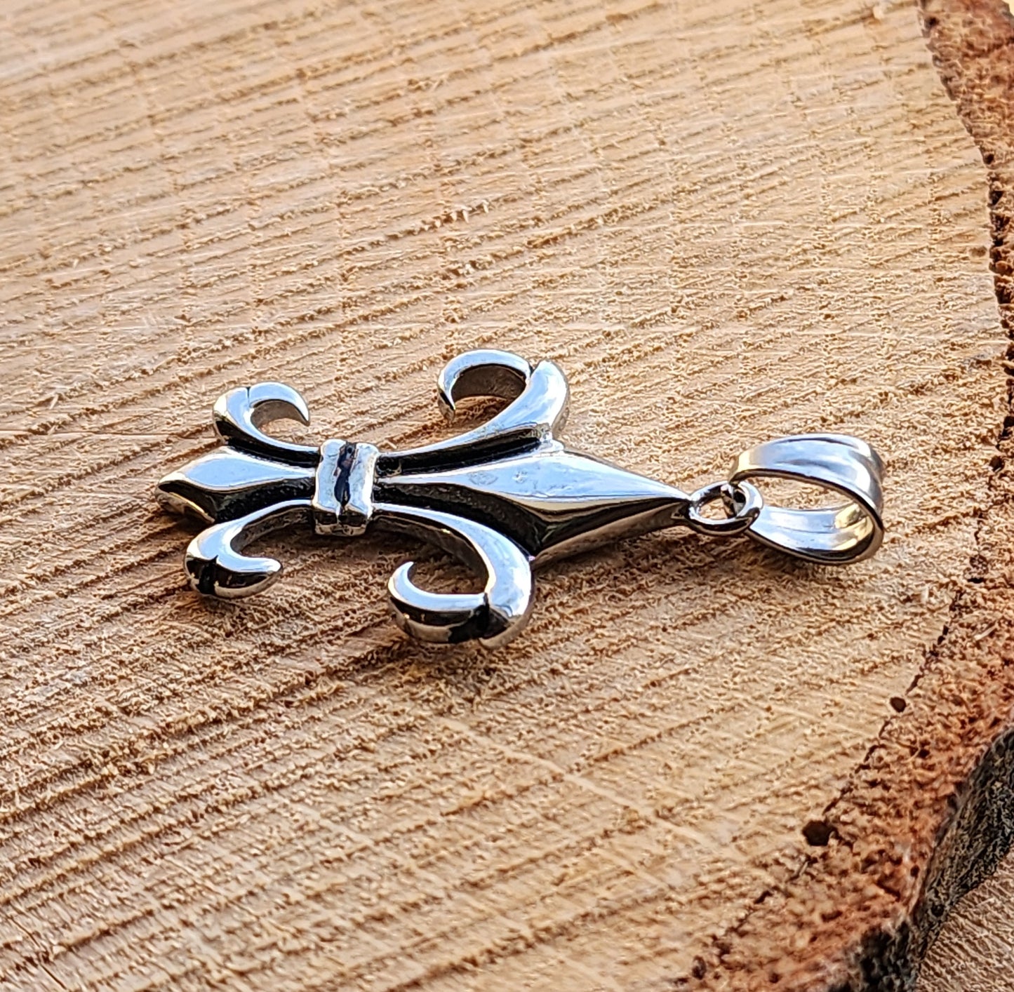 Elongated Fleur De Lis Stainless Steel Pendant