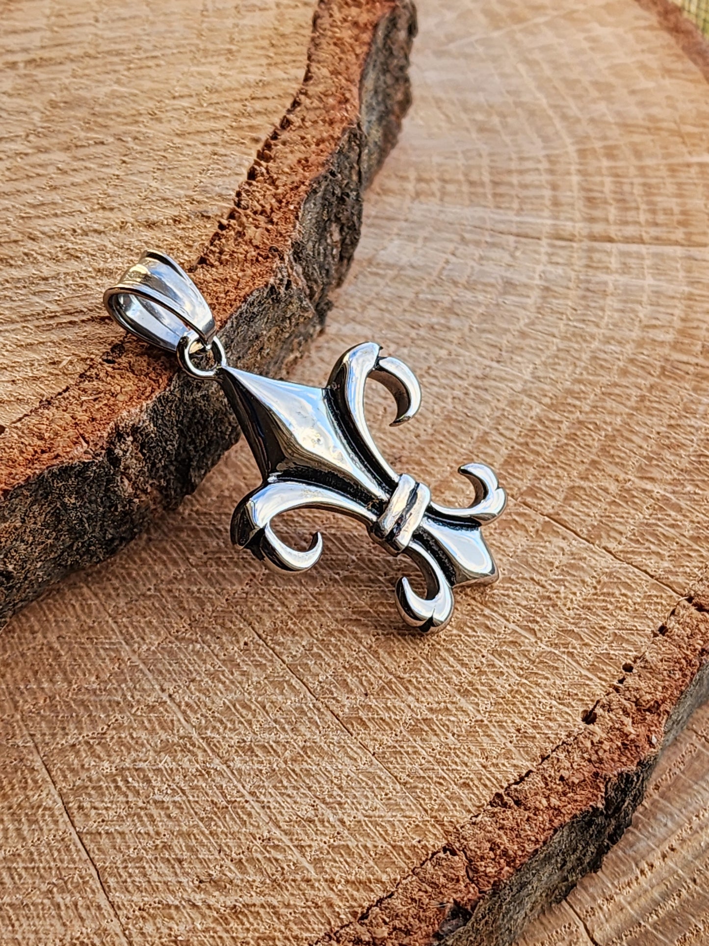 Elongated Fleur De Lis Stainless Steel Pendant