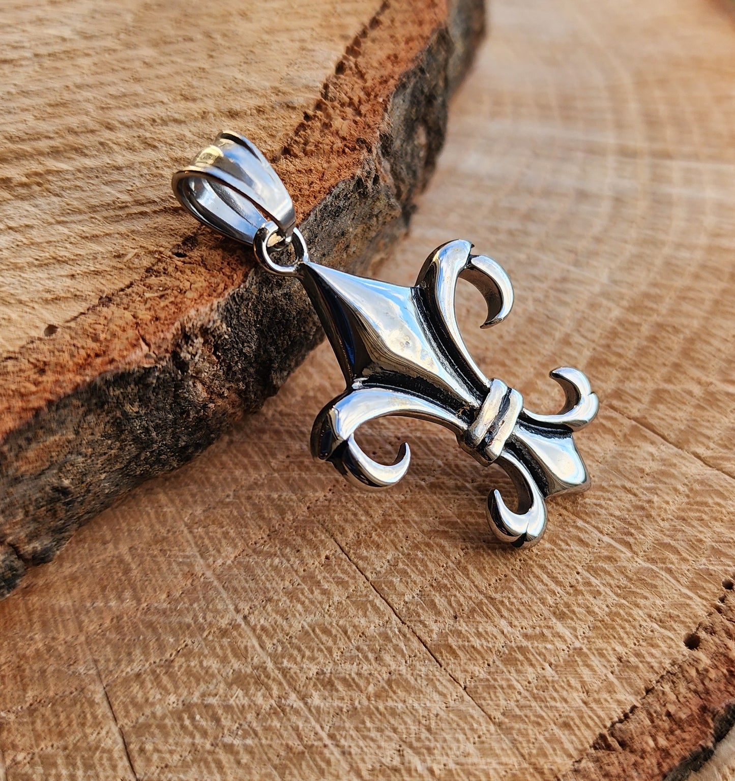 Elongated Fleur De Lis Stainless Steel Pendant