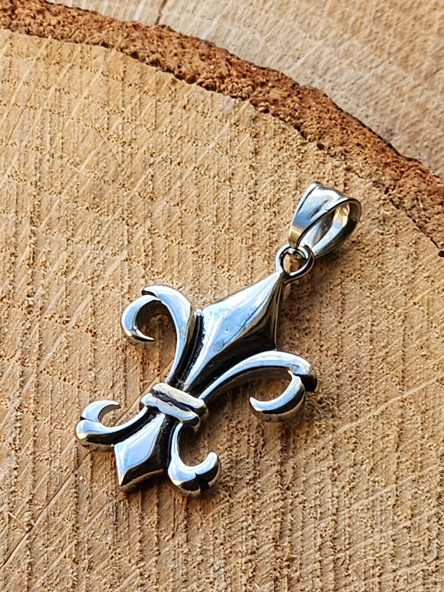 Elongated Fleur De Lis Stainless Steel Pendant