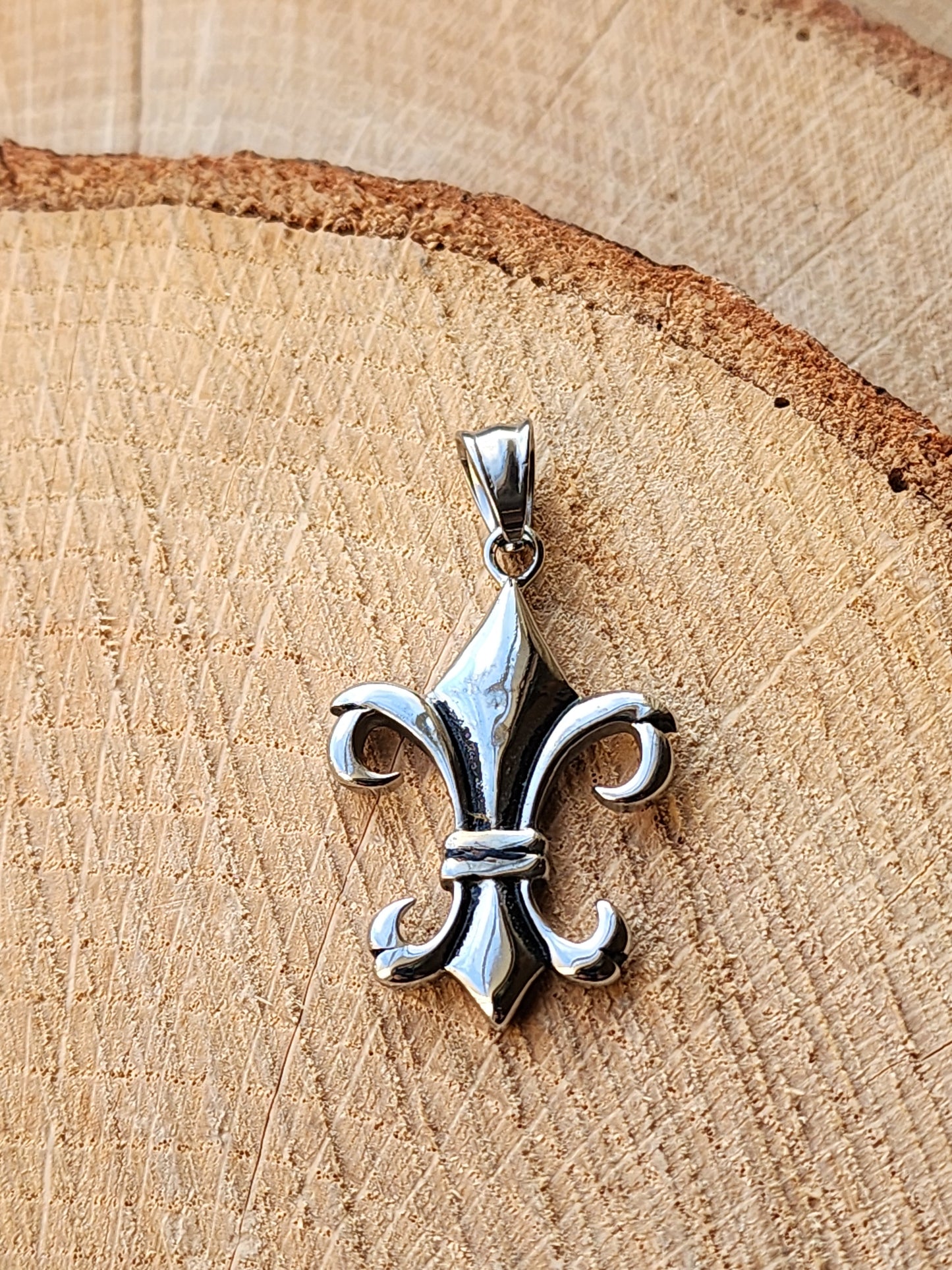 Elongated Fleur De Lis Stainless Steel Pendant